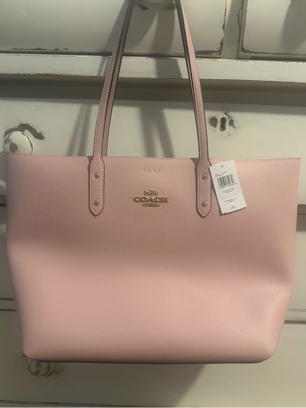 NWT. Pink pebbled Coach tote bag